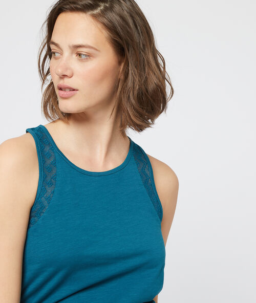 Bavlněn&eacute; t&iacute;lko s grafickou krajkou petrolejov&aacute; modř.