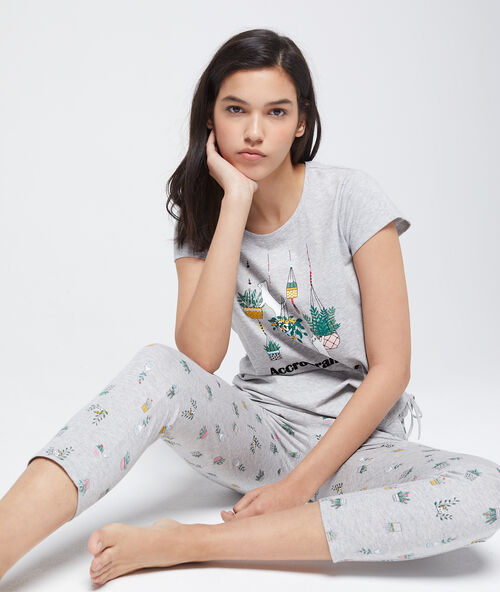 Kapri kalhoty s květinov&yacute;m potiskem z bio bavlny &scaron;ed&aacute;.