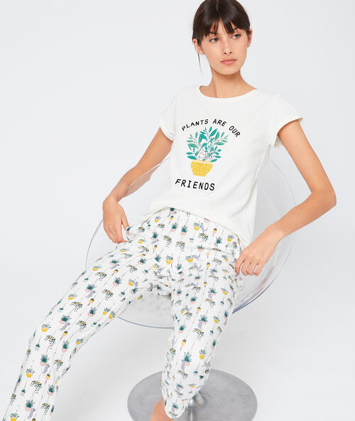 Kalhoty s potiskem b&eacute;žov&aacute;.