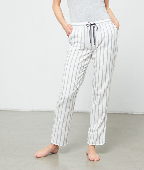 Pruhovan&eacute; kalhoty &scaron;ed&aacute;.